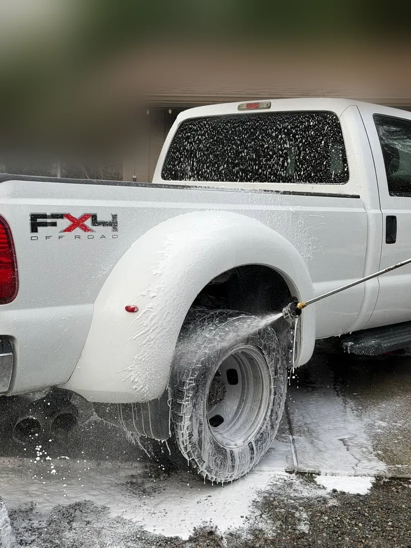 Foam hand wash on a white Ford pickup