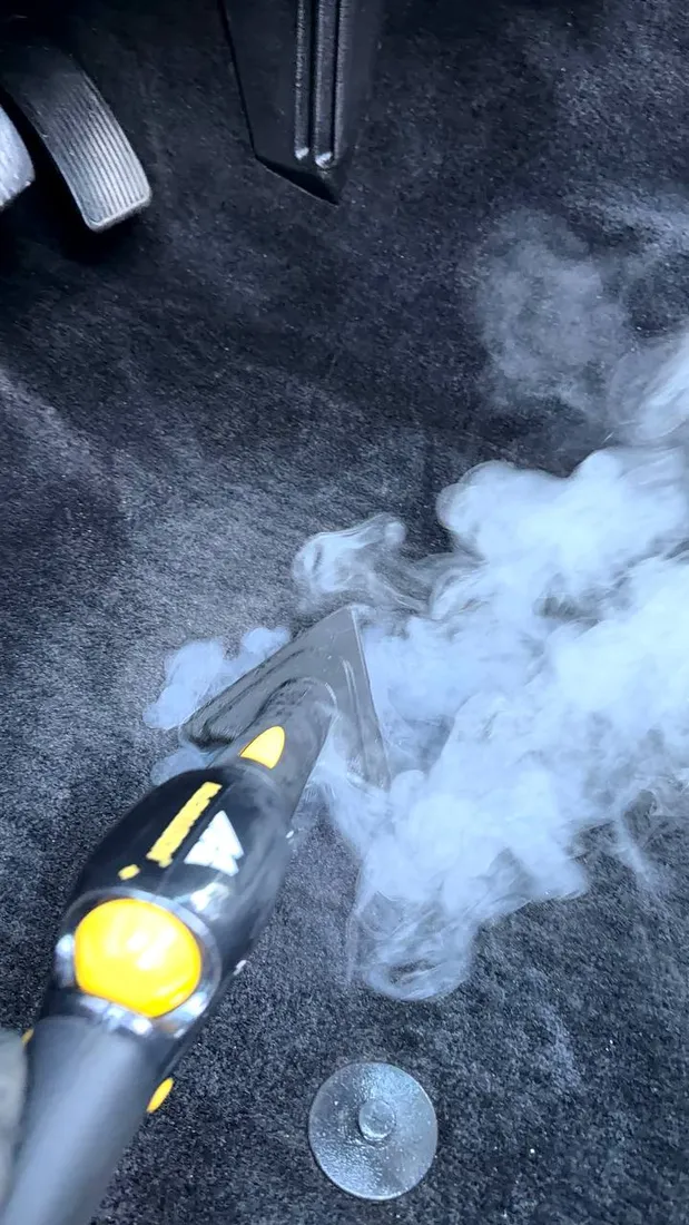 Steam cleaning the carpet